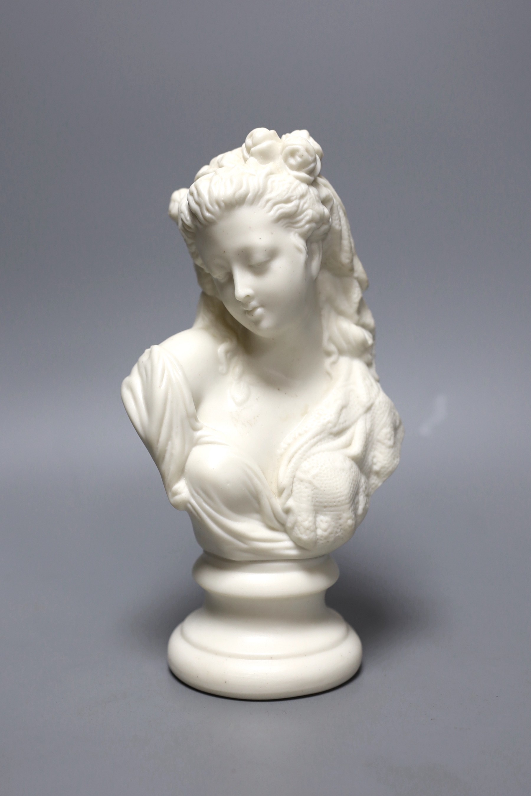 An English parian bust of an attractive Victorian girl, probably Robinson and Leadbetter, c.1890. 21cm